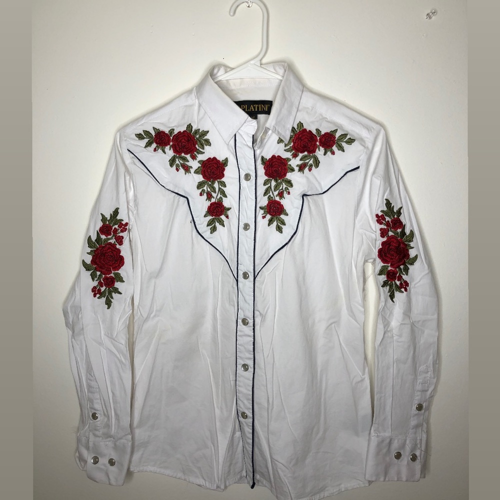 This is a floral white button down shirt.